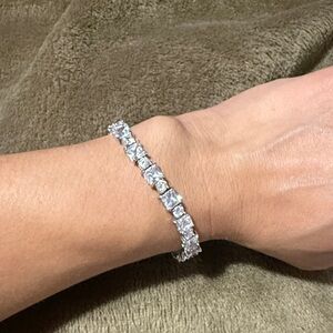 925. Sterling Silver tennis Bracelet / CZ  Stones with security latch.